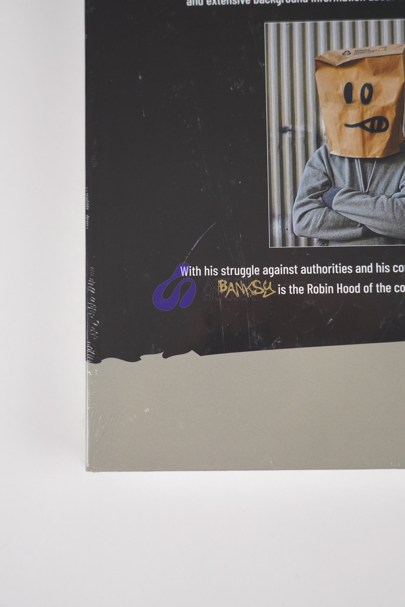 Detailed close-up of the lower section of the back cover of "Banksy: The Walled Off Art Editions Are Sold Out."