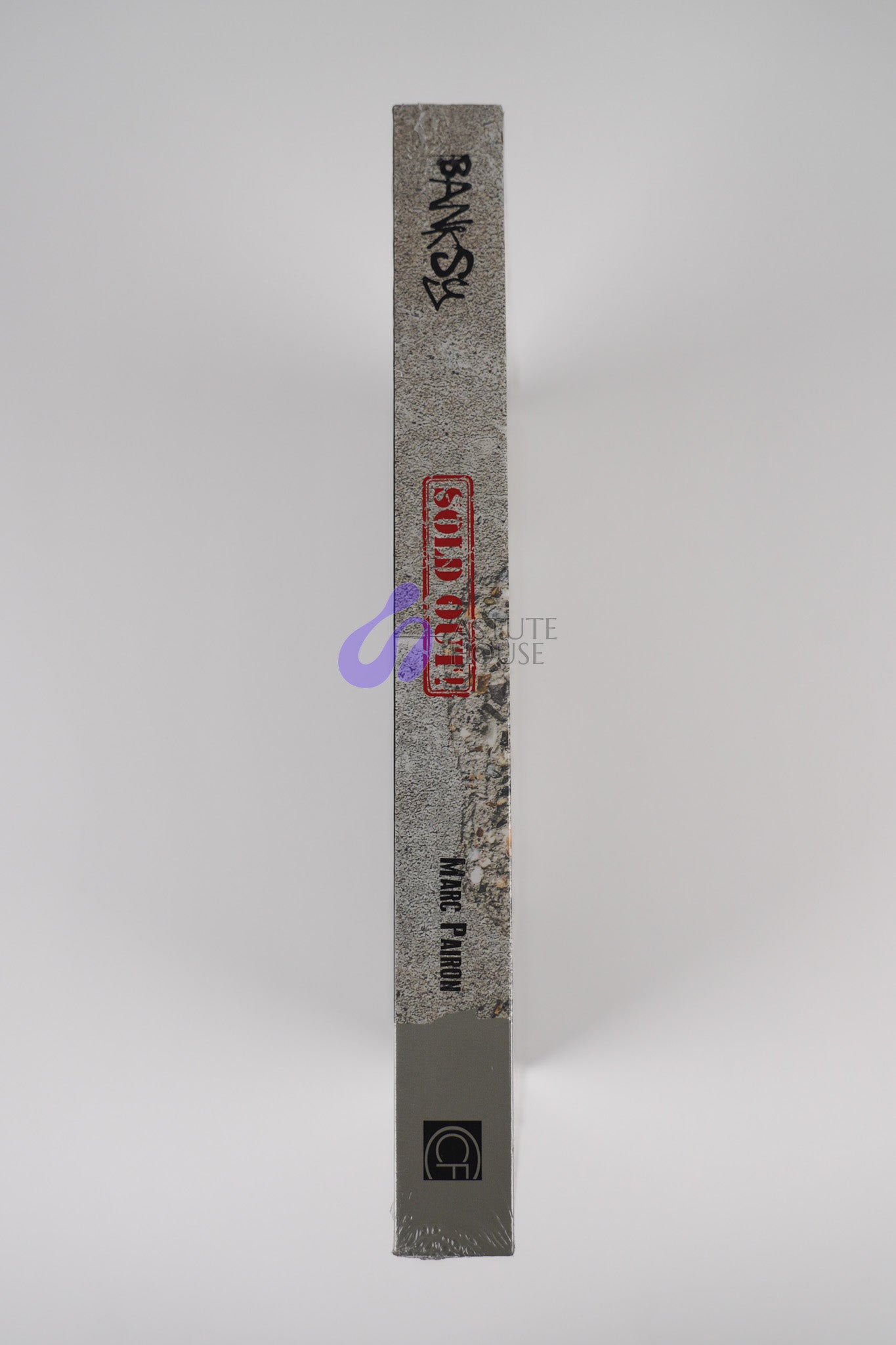 Spine of the book "Banksy: The Walled Off Art Editions Are Sold Out" featuring the title and author name.